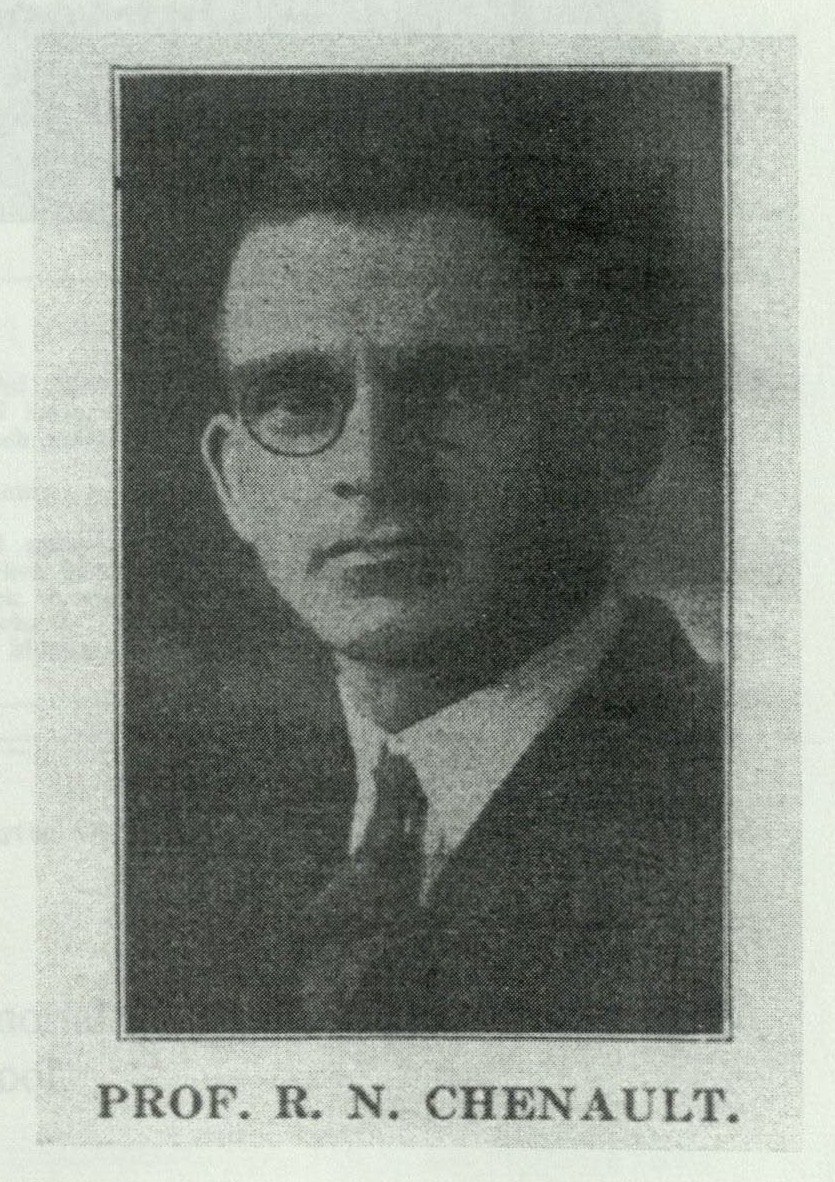 Portrait photograph of Professor R. N. Chenault in round glasses and a dark suit