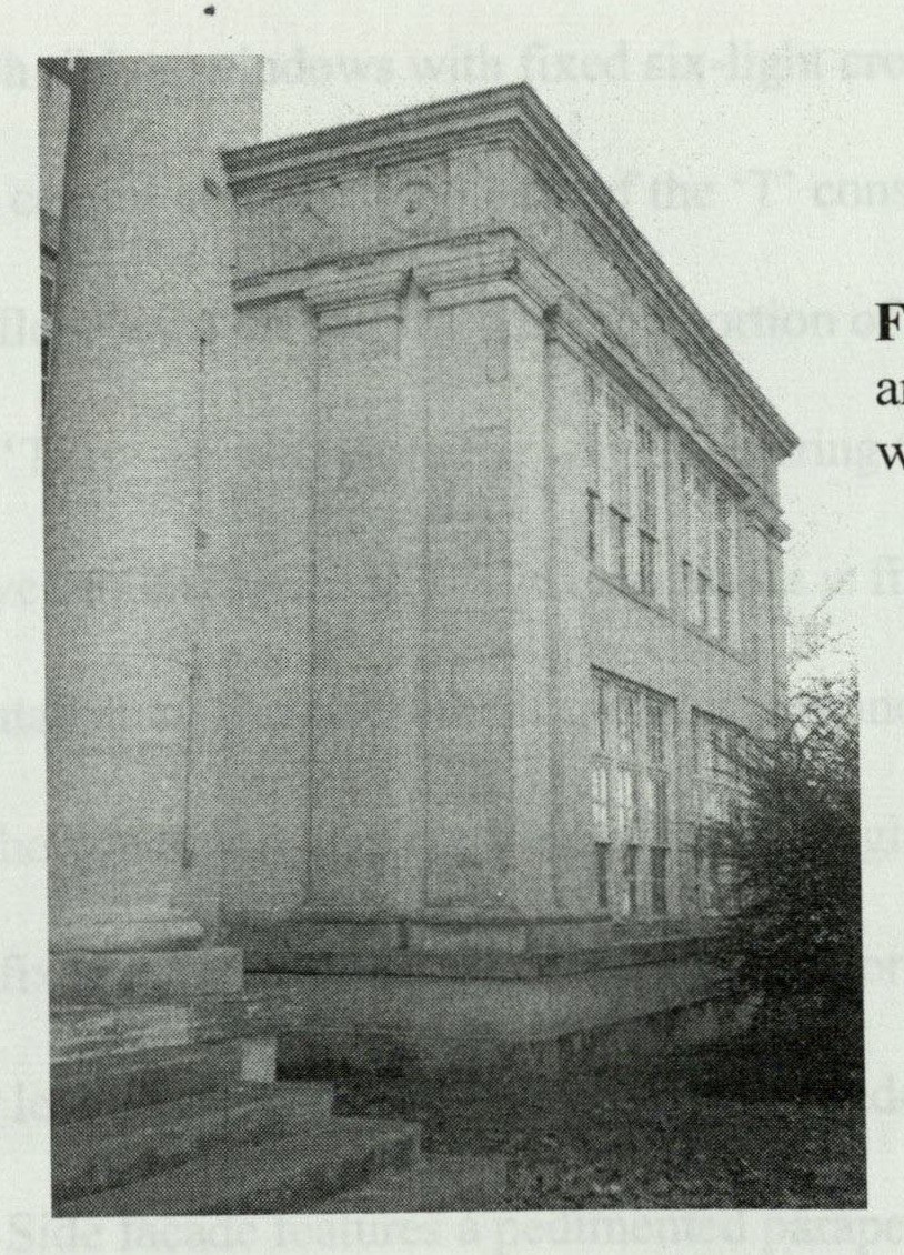 Double corner pilasters rising through two stories at one corner of the building's wing