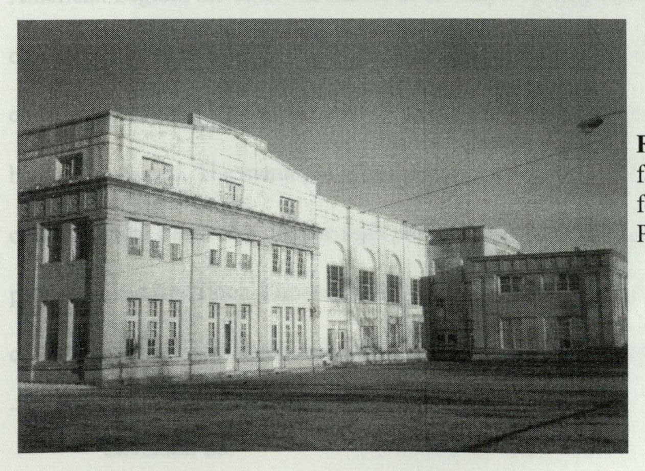Right side facade at the base of the T plan, featuring the tall Palladian windows of the auditorium