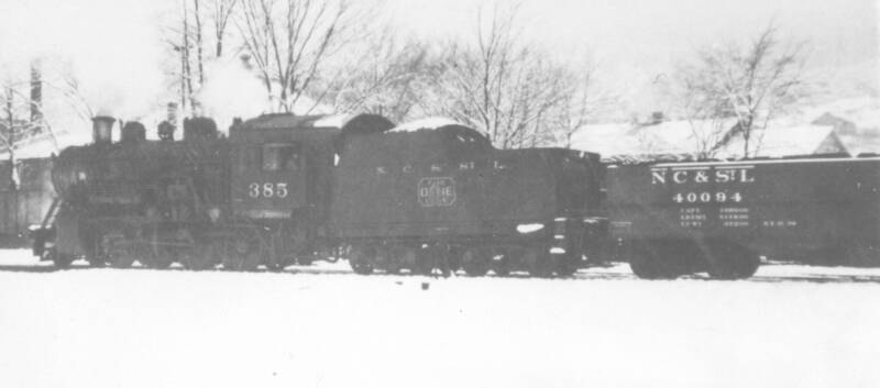 An NC&StL steam train at Whitwell in the snow, 1920s